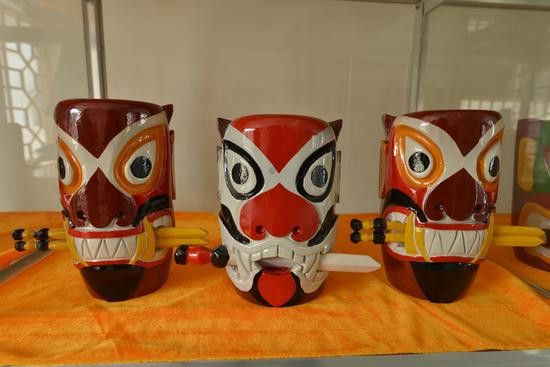 省级保护名录传统美术古敢水族吞口制作简介 - 富源县文化馆官方网站